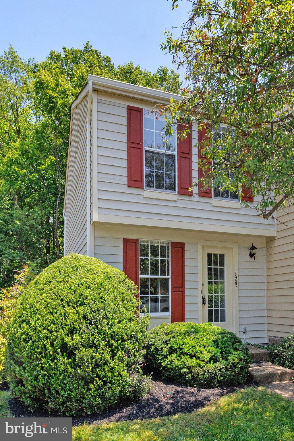 1665 Fieldthorn Drive Reston, VA 20194 - Photo 1 of 38 front view of a house with a yard