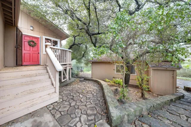 a view of entryway with wooden stairs
