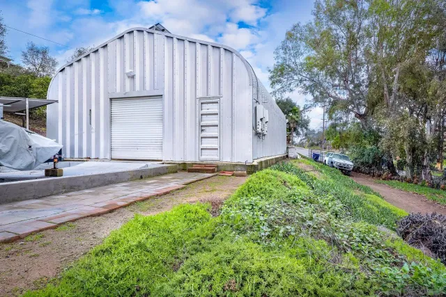 a view of backyard with green space