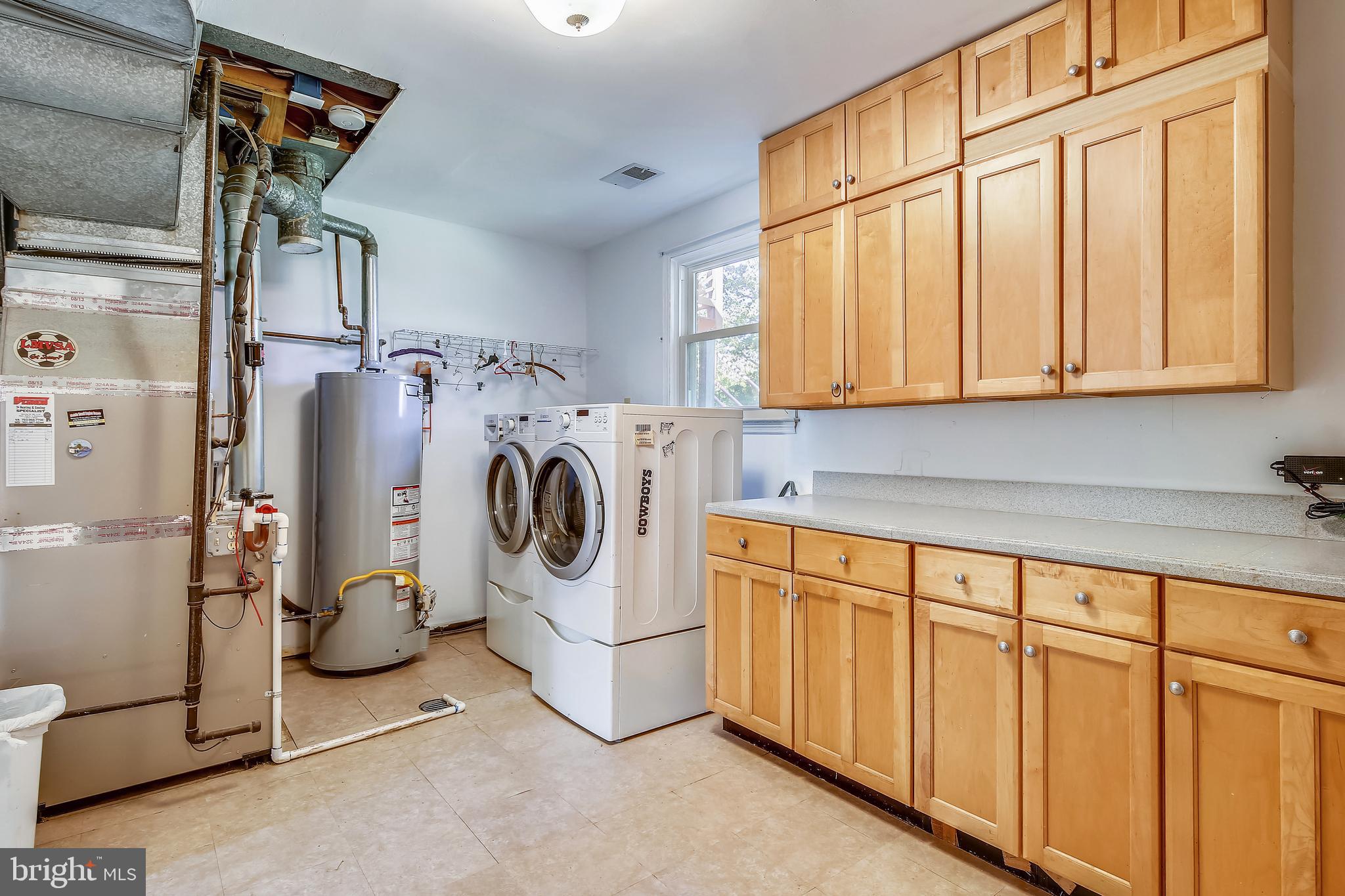 6012 Sumner Road Alexandria, VA 22310 - Photo 15 of 26 Laundry Room w/ Cabinetry