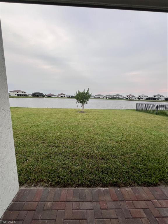 5261 Lamone Ln Avenue Immokalee, FL 34142 - Photo 11 of 14 View of yard with a water view