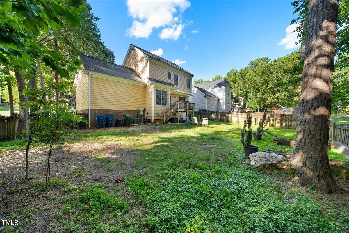 11905 Radner Way Raleigh, NC 27613 - Photo 21 of 35 a view of a house with a big yard