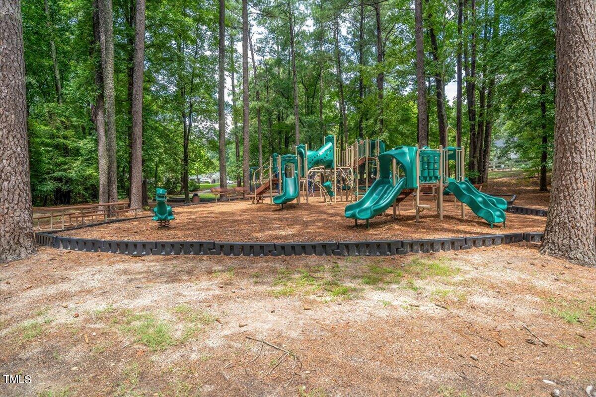 11905 Radner Way Raleigh, NC 27613 - Photo 28 of 35 a view of a park with swings