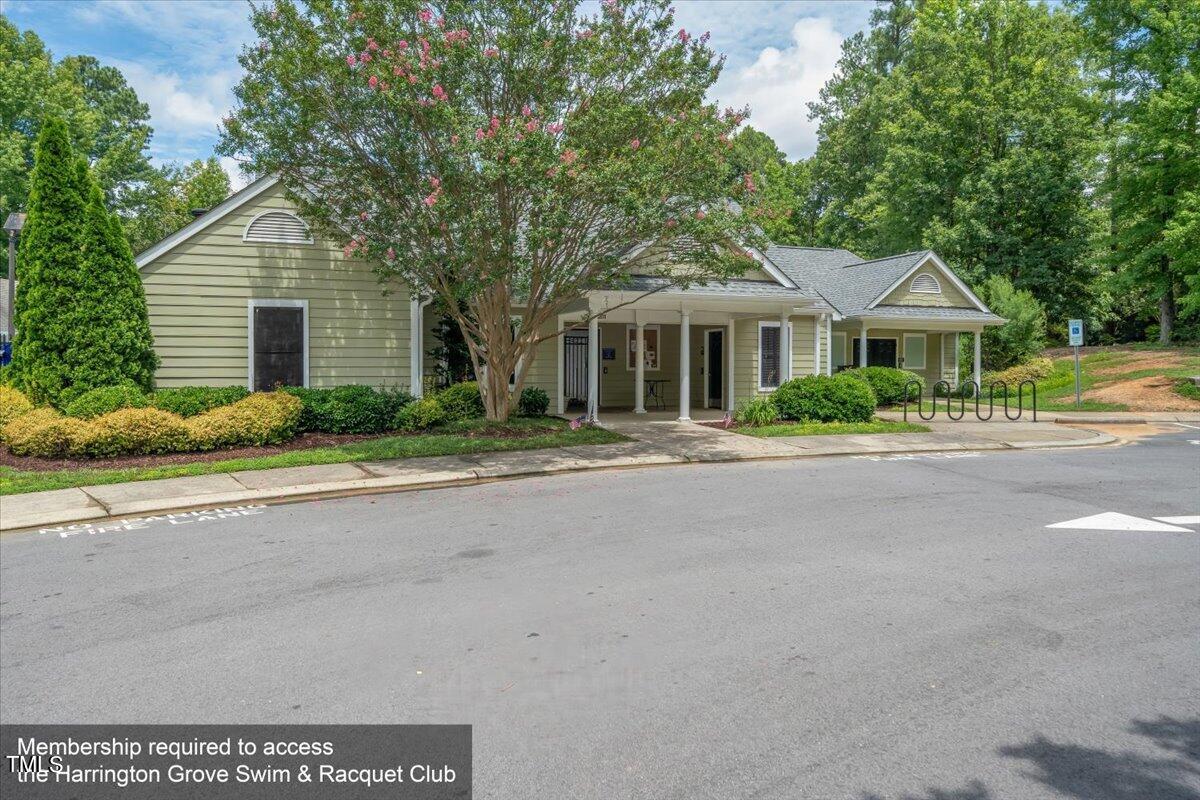 11905 Radner Way Raleigh, NC 27613 - Photo 31 of 35 a front view of house with yard and green space