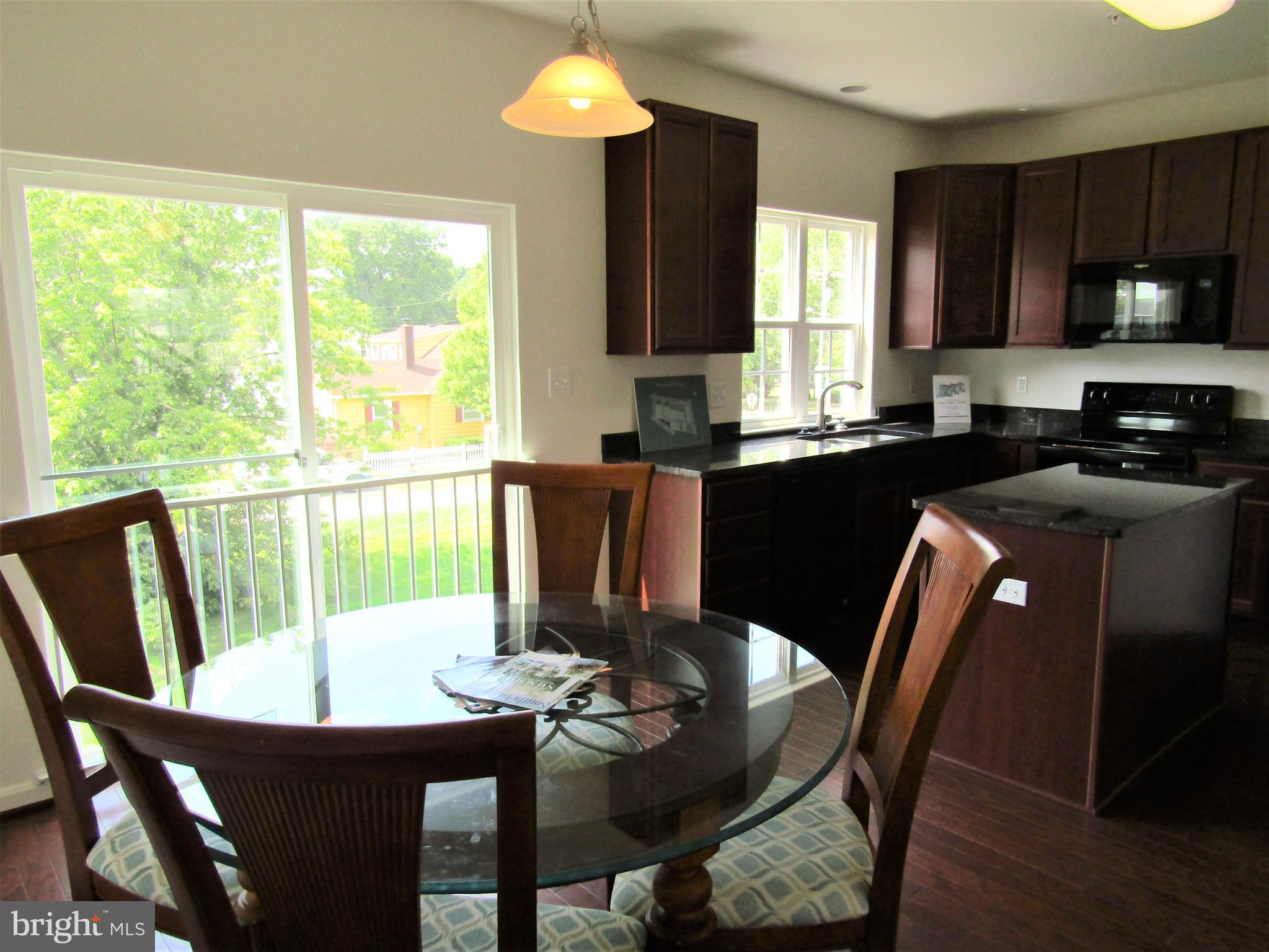 338 Appleby School Road Cambridge, MD 21613 - Photo 8 of 25 Dining Room & Kitchen - 2nd Floor