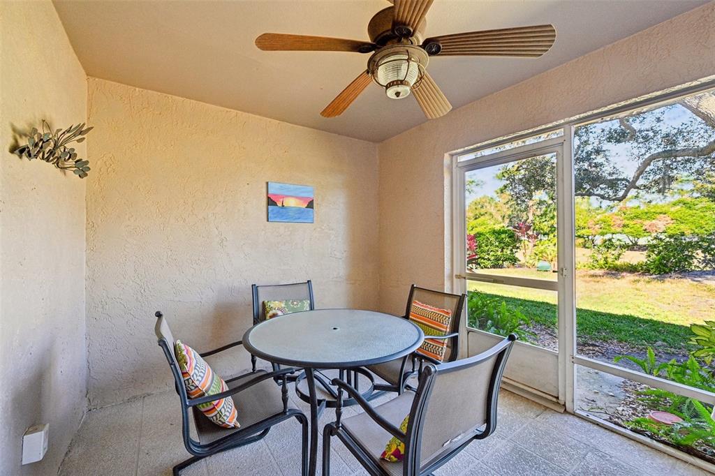 2215 Olive Branch Drive Sun City Center, FL 33573 - Photo 23 of 60 a view of a dining room with furniture window and outside view