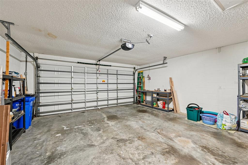 2215 Olive Branch Drive Sun City Center, FL 33573 - Photo 25 of 60 a view of a garage with storage