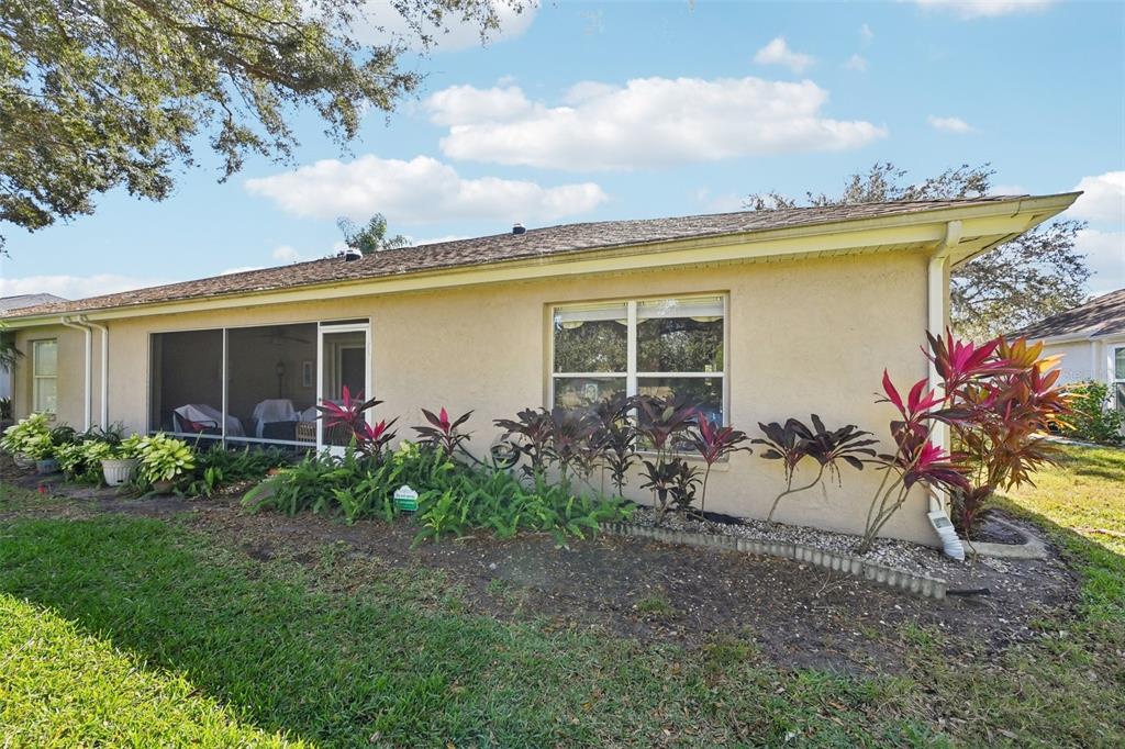 2215 Olive Branch Drive Sun City Center, FL 33573 - Photo 26 of 60 a view of a house with patio