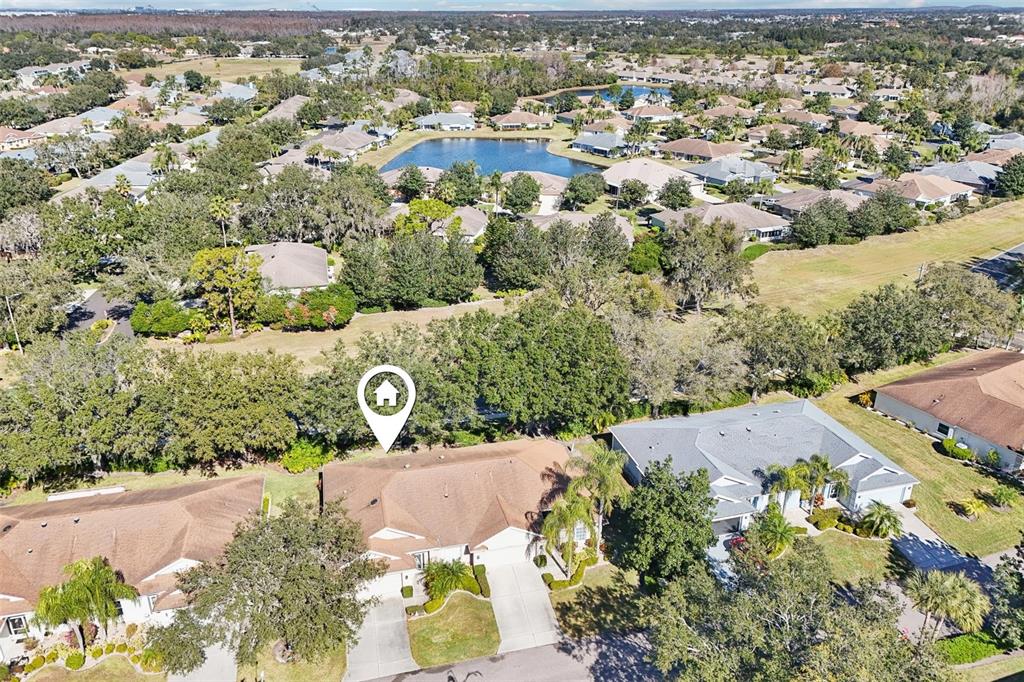 2215 Olive Branch Drive Sun City Center, FL 33573 - Photo 29 of 60 an aerial view of a city with lots of residential buildings
