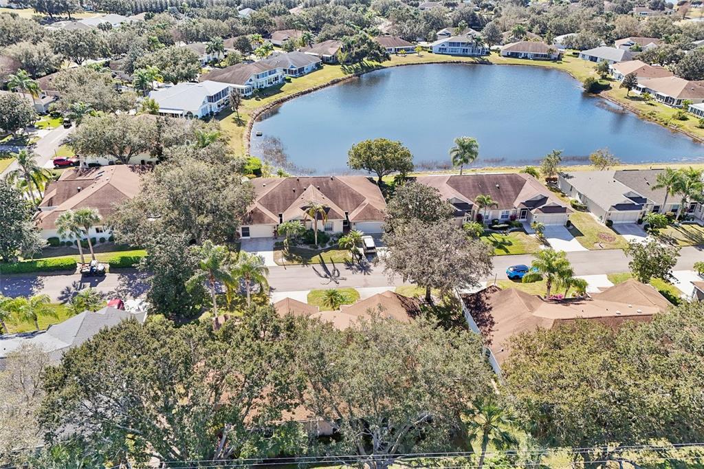 2215 Olive Branch Drive Sun City Center, FL 33573 - Photo 33 of 60 an aerial view of residential houses with outdoor space