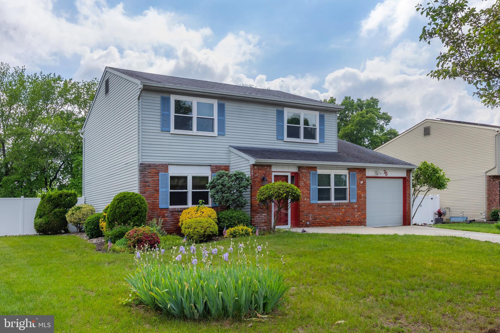 75 Hartford Road Sewell, NJ 08080 - Photo 1 of 23 a front view of house with yard and green space