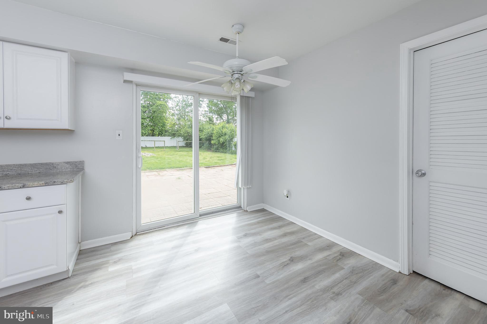 75 Hartford Road Sewell, NJ 08080 - Photo 15 of 23 wooden floor in an empty room with a window