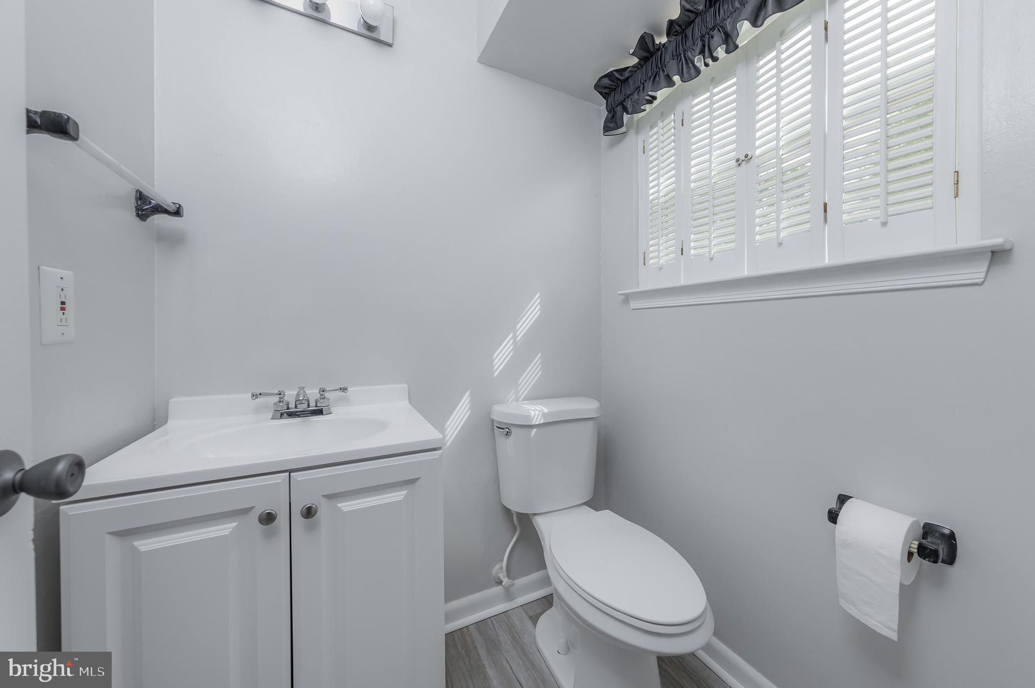 75 Hartford Road Sewell, NJ 08080 - Photo 17 of 23 a white toilet sitting next to a bathroom sink