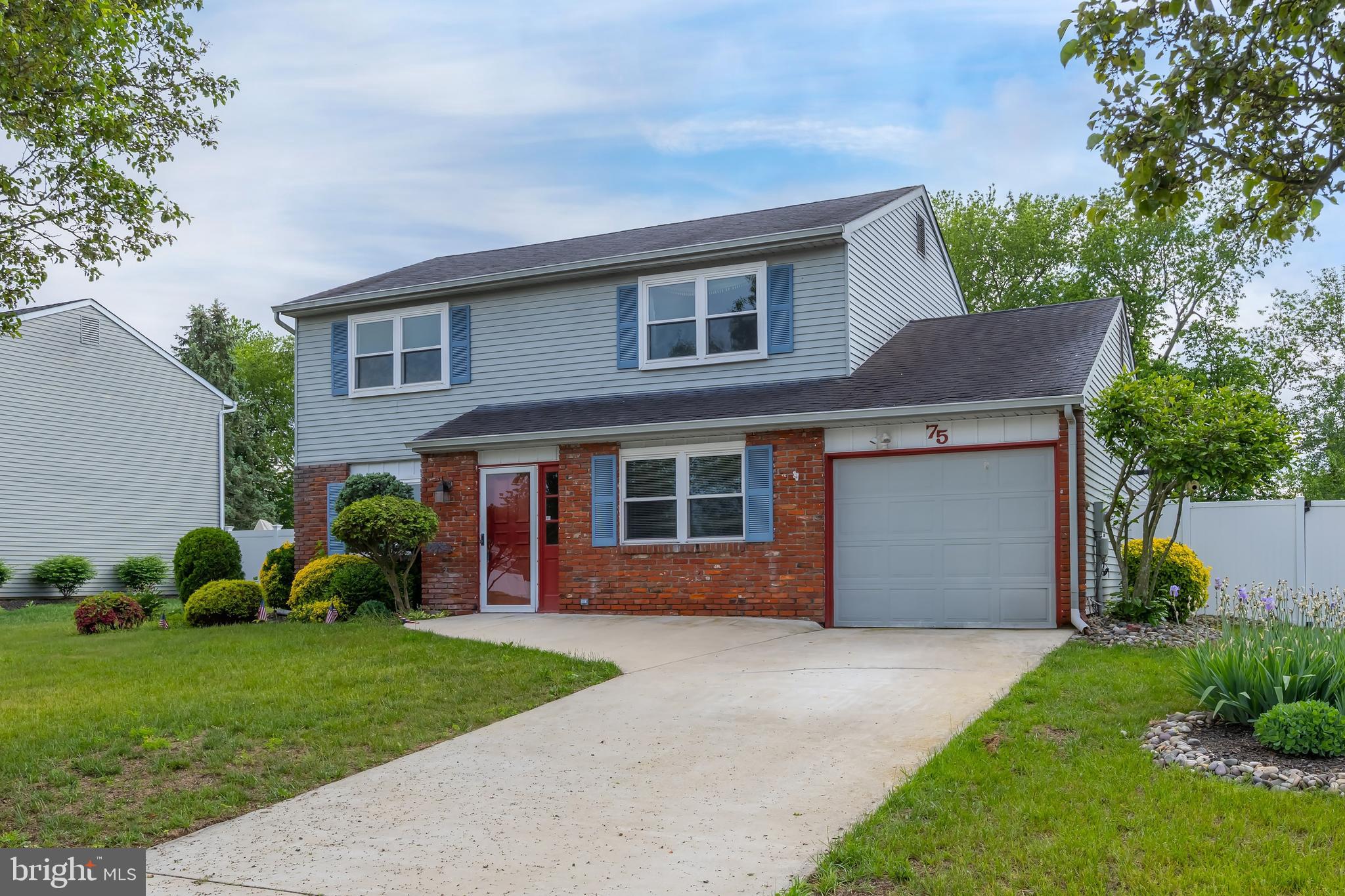 75 Hartford Road Sewell, NJ 08080 - Photo 2 of 23 a front view of house with yard and green space