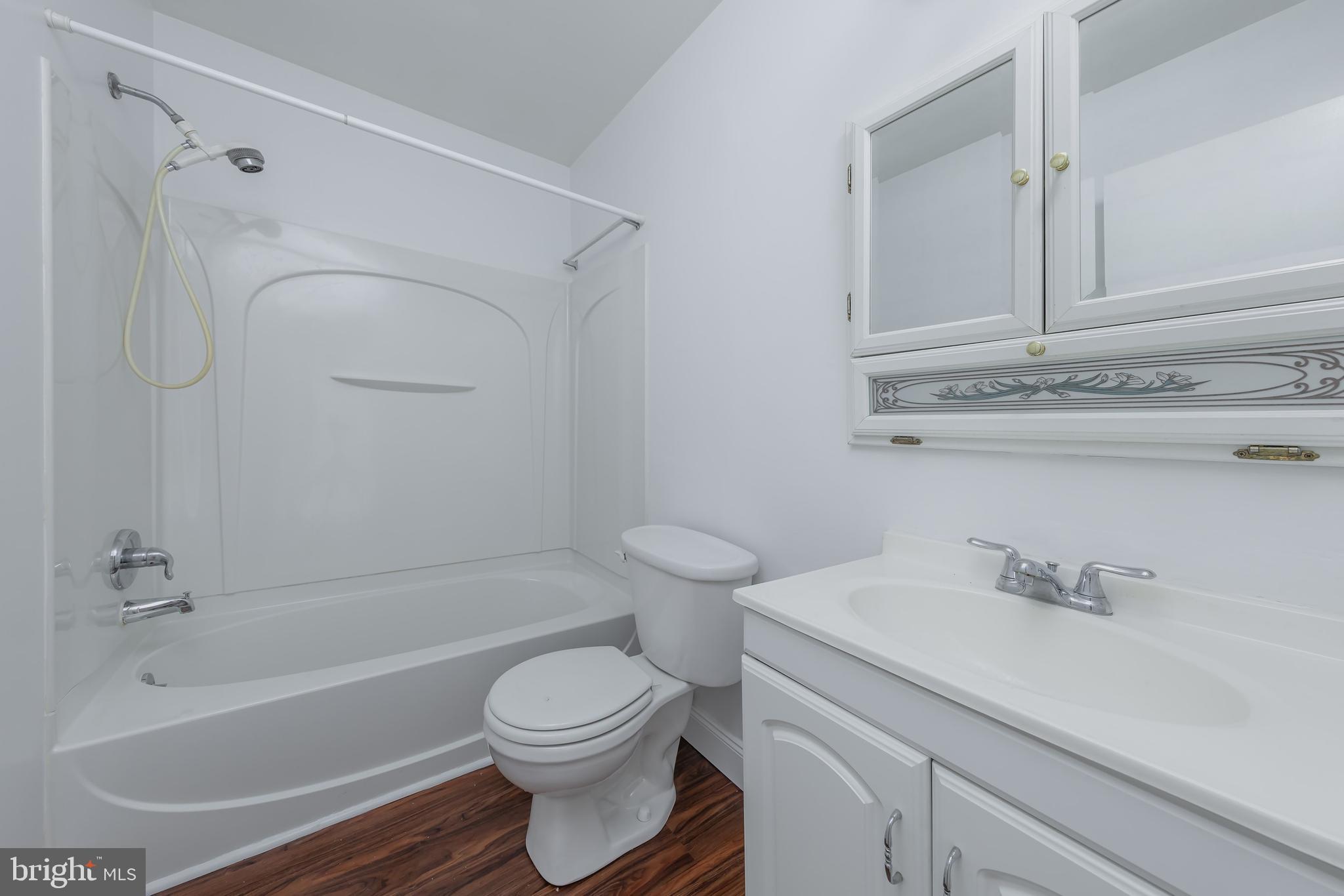 75 Hartford Road Sewell, NJ 08080 - Photo 21 of 23 a bathroom with a sink a toilet and a bathtub