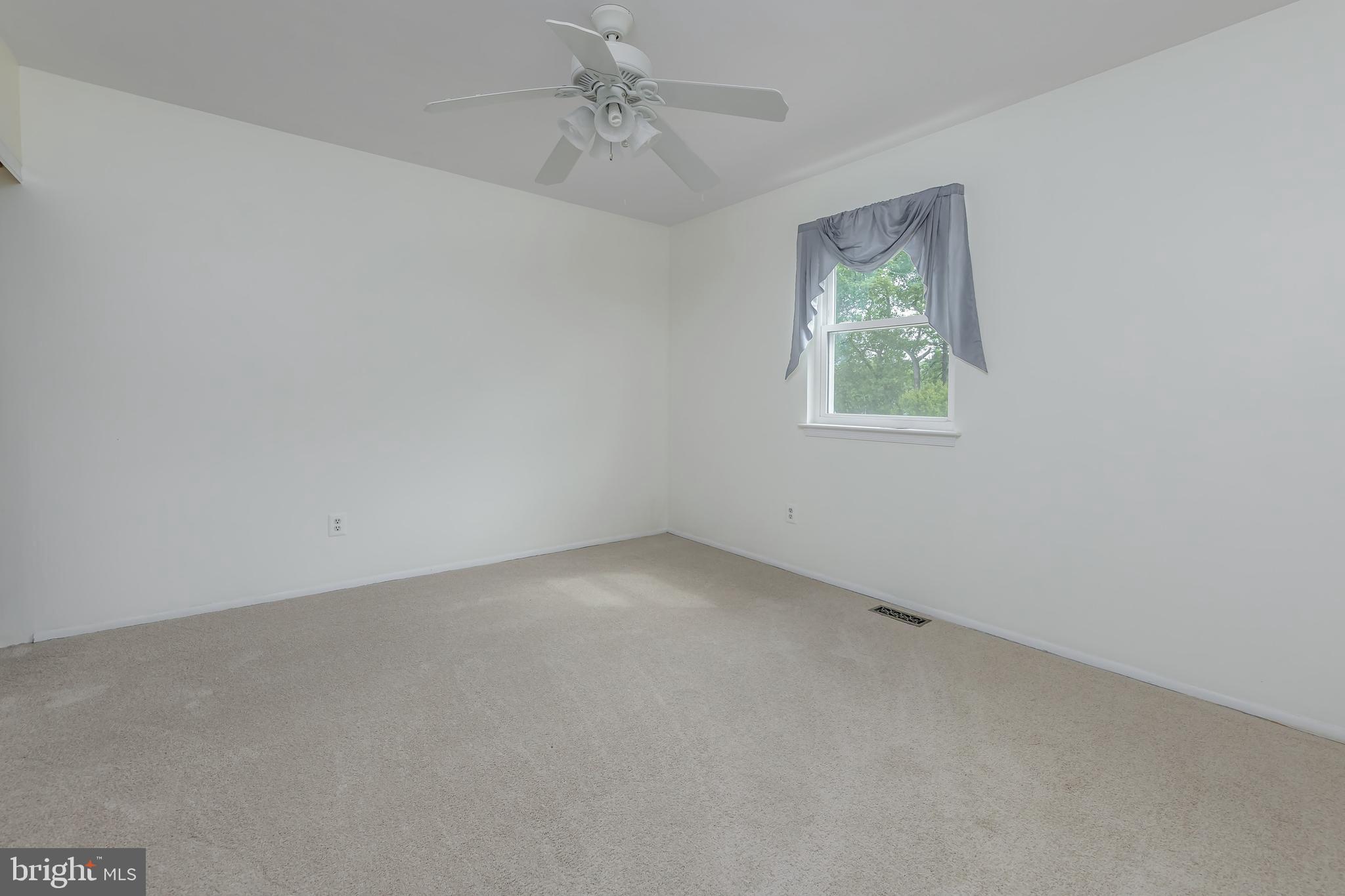 75 Hartford Road Sewell, NJ 08080 - Photo 23 of 23 an empty room with a window