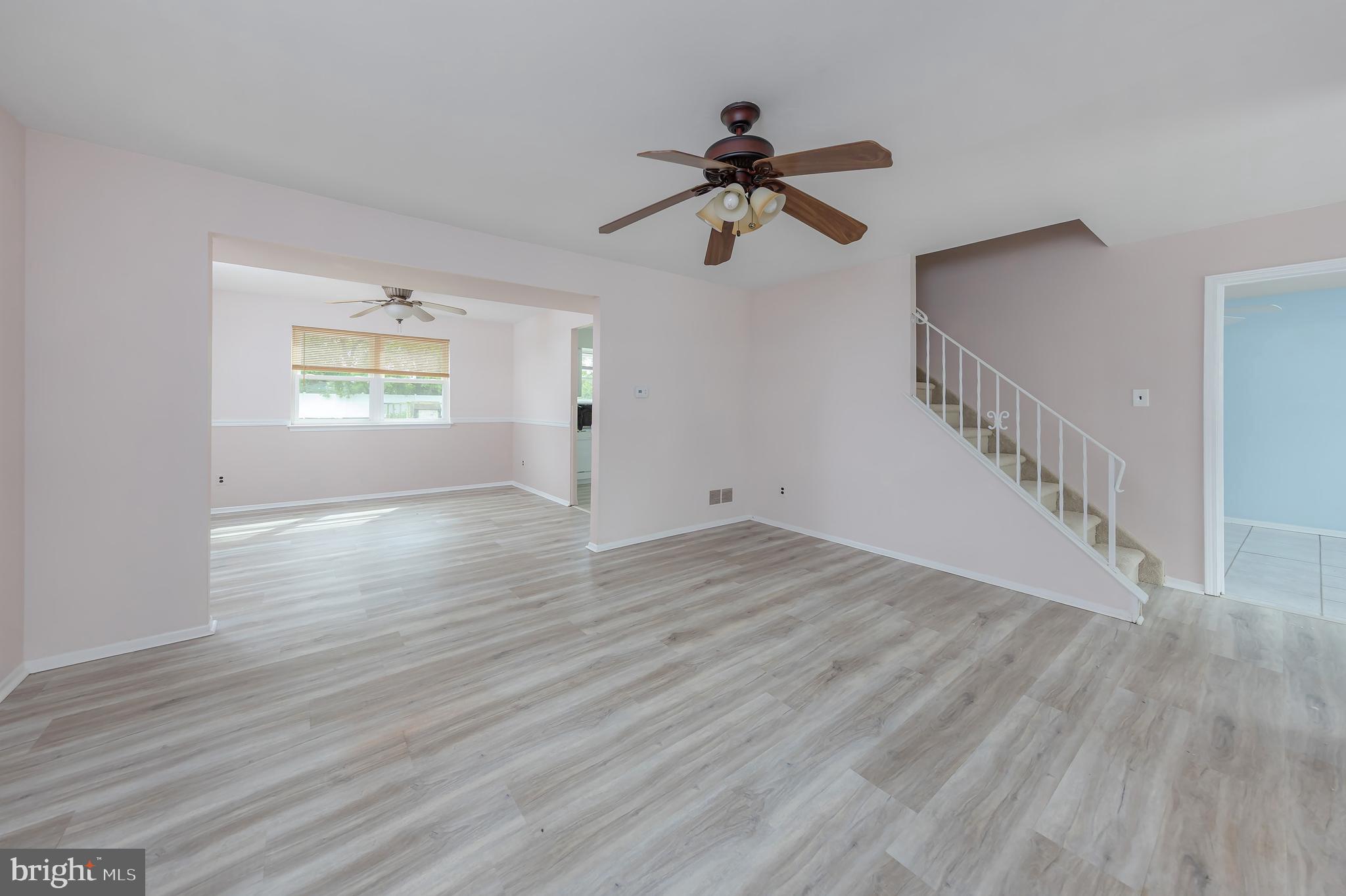 75 Hartford Road Sewell, NJ 08080 - Photo 9 of 23 a view of empty room with wooden floor and fan