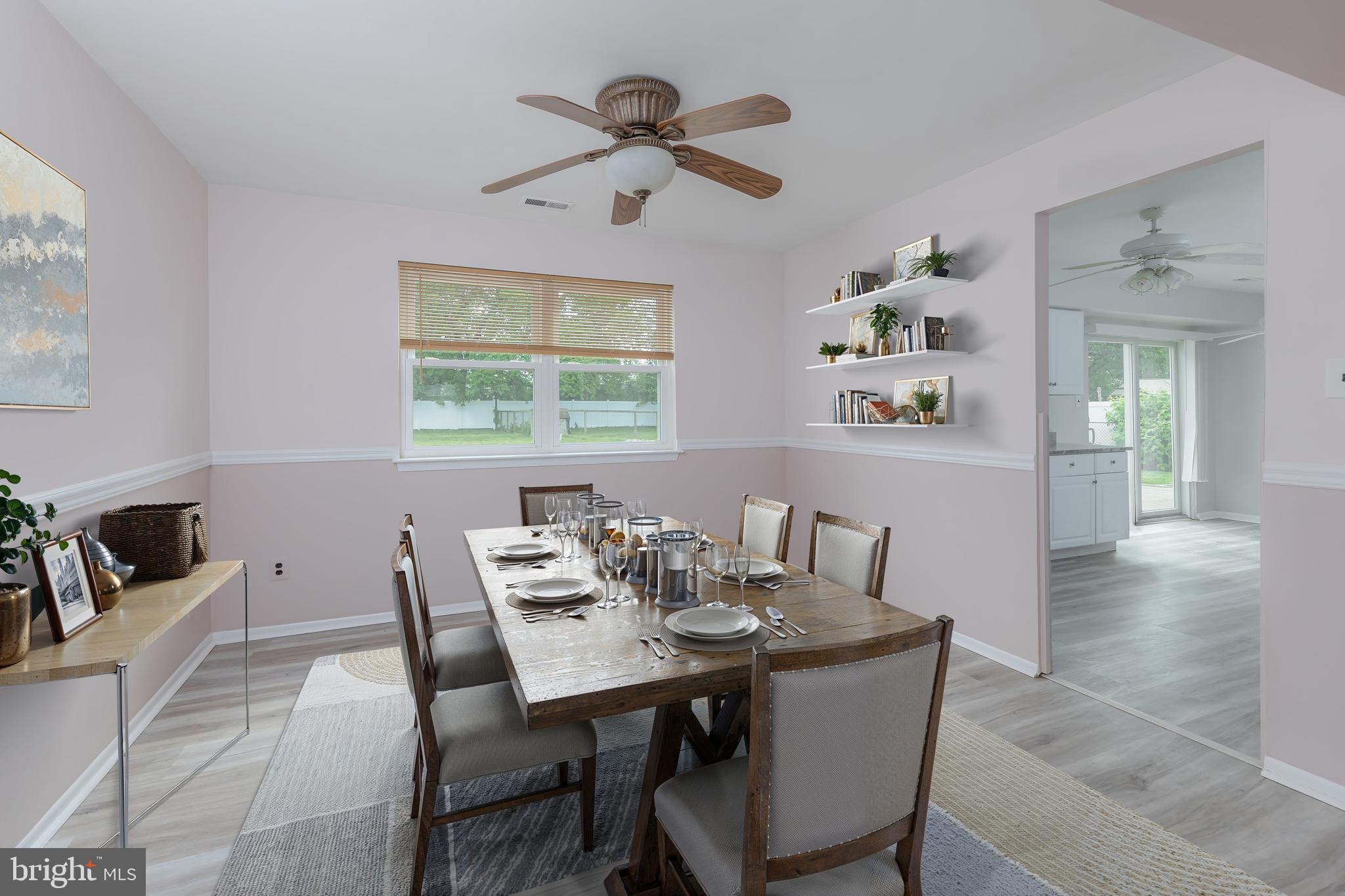 75 Hartford Road Sewell, NJ 08080 - Photo 10 of 23 a view of a dining room with furniture window and wooden floor