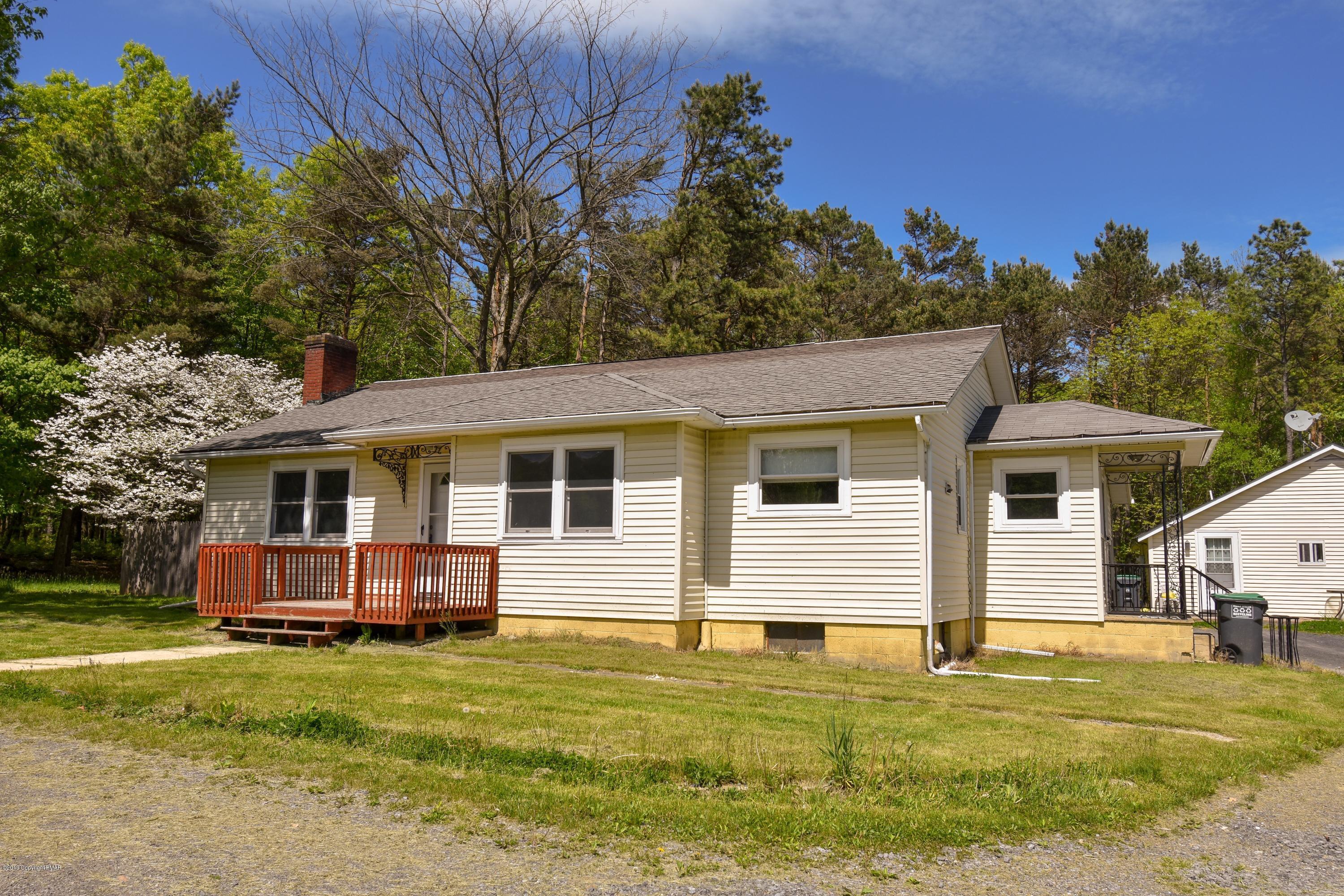 3284 Highway 115, Unit 1 Effort, PA 18330 - Photo 1 of 17 a view of a house with a backyard