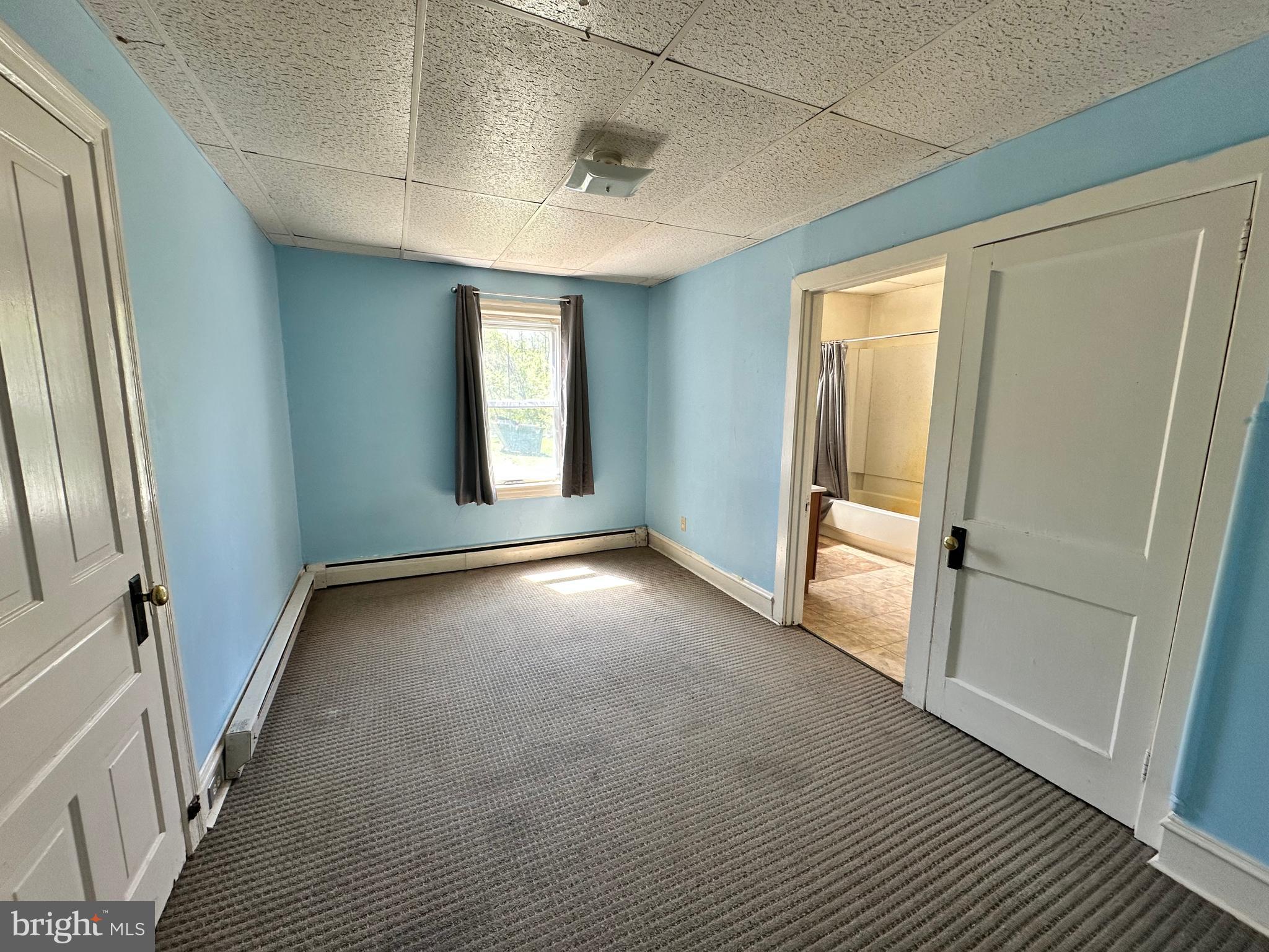 360 West Paletown Road, Unit 1R Quakertown, PA 18951 - Photo 5 of 6 an empty room with windows
