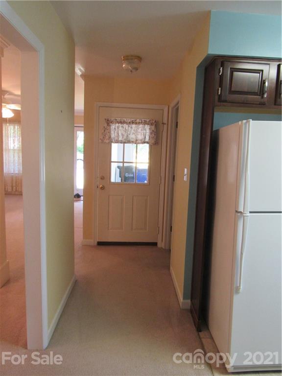109 Carpenter Lane Rutherfordton, NC 28139 - Photo 13 of 28 a view of hallway with washer and dryer