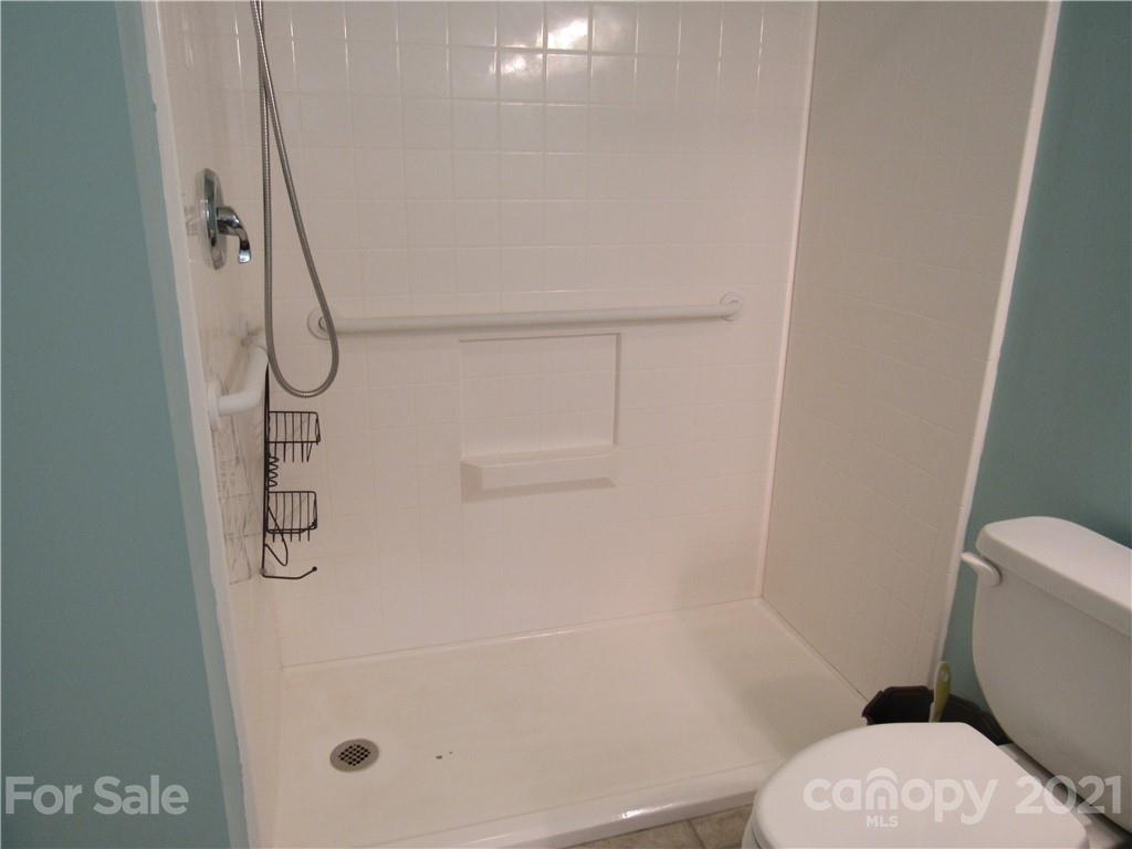 109 Carpenter Lane Rutherfordton, NC 28139 - Photo 16 of 28 a bathroom with a toilet and a shower