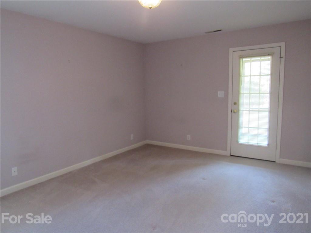 109 Carpenter Lane Rutherfordton, NC 28139 - Photo 19 of 28 an empty room with a window