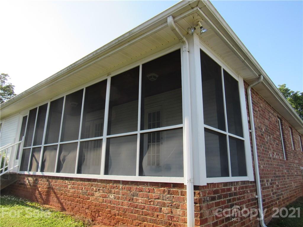 109 Carpenter Lane Rutherfordton, NC 28139 - Photo 5 of 28 a view of a house with a window