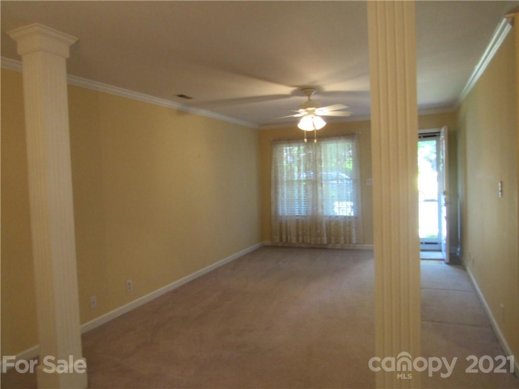 109 Carpenter Lane Rutherfordton, NC 28139 - Photo 8 of 28 a view of a livingroom with a ceiling fan and window