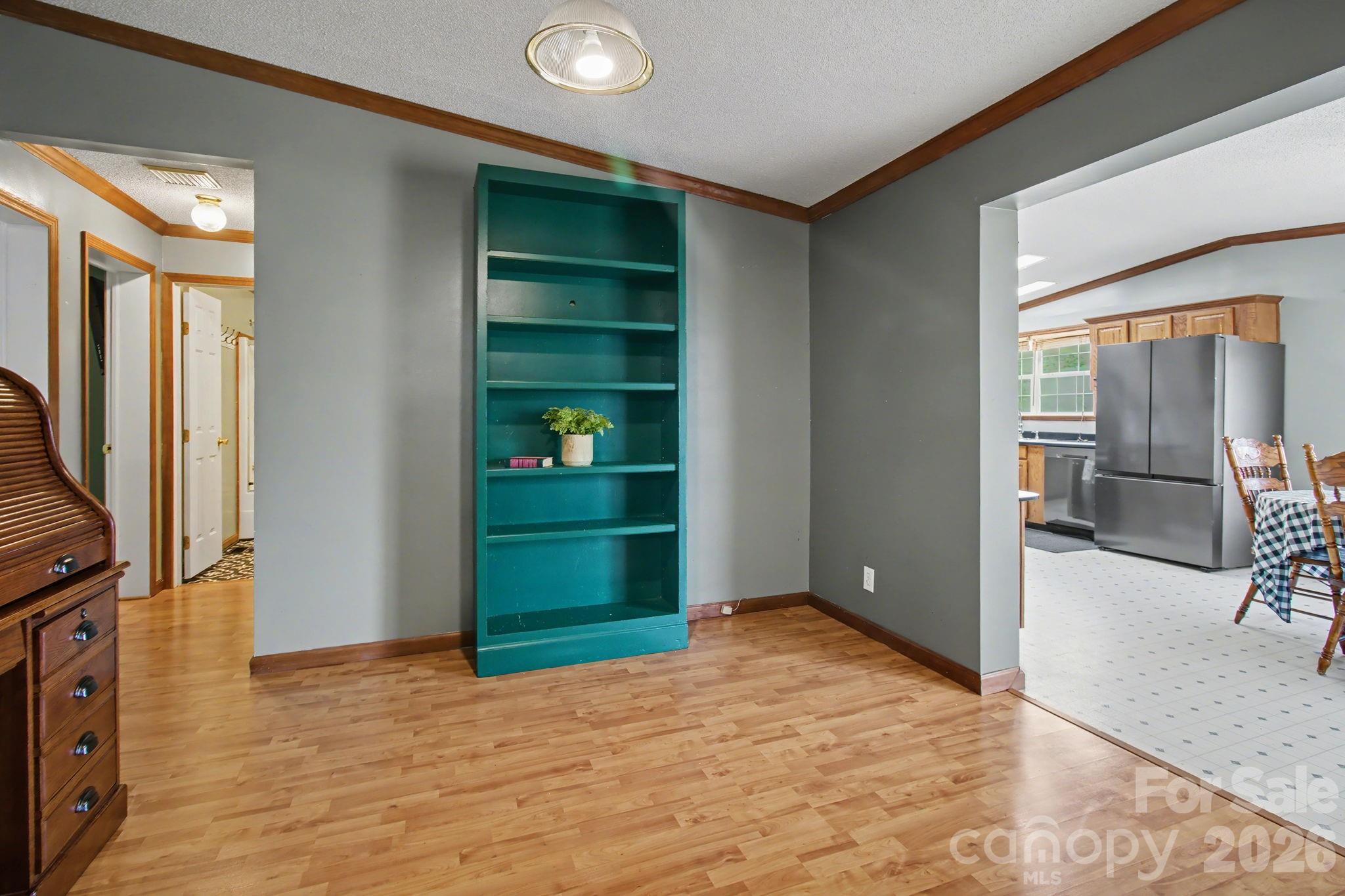 74 Chambers Road Weaverville, NC 28787 - Photo 13 of 43 a view of empty room with wooden floor and fan