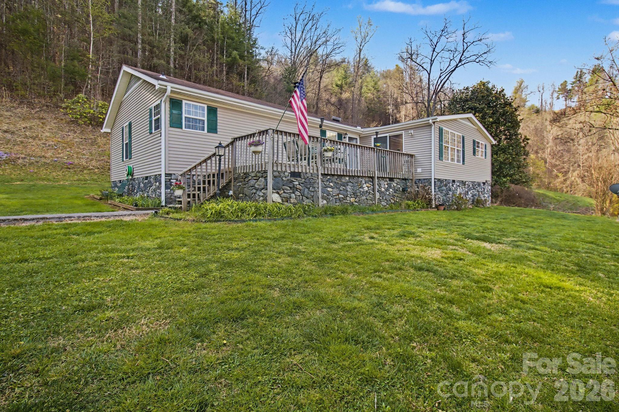 74 Chambers Road Weaverville, NC 28787 - Photo 4 of 43 a view of a house with a yard