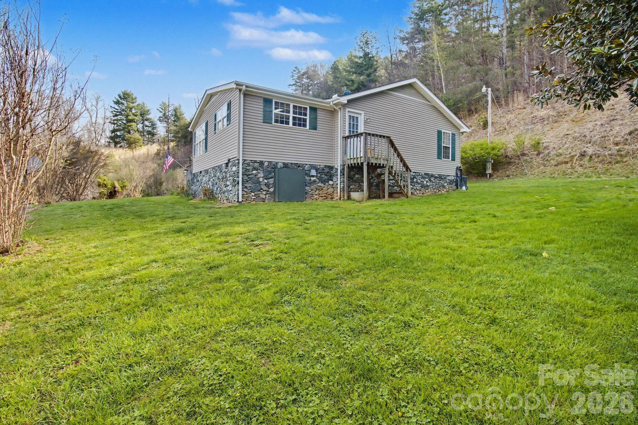 74 Chambers Road Weaverville, NC 28787 - Photo 41 of 43 a front view of a house with garden