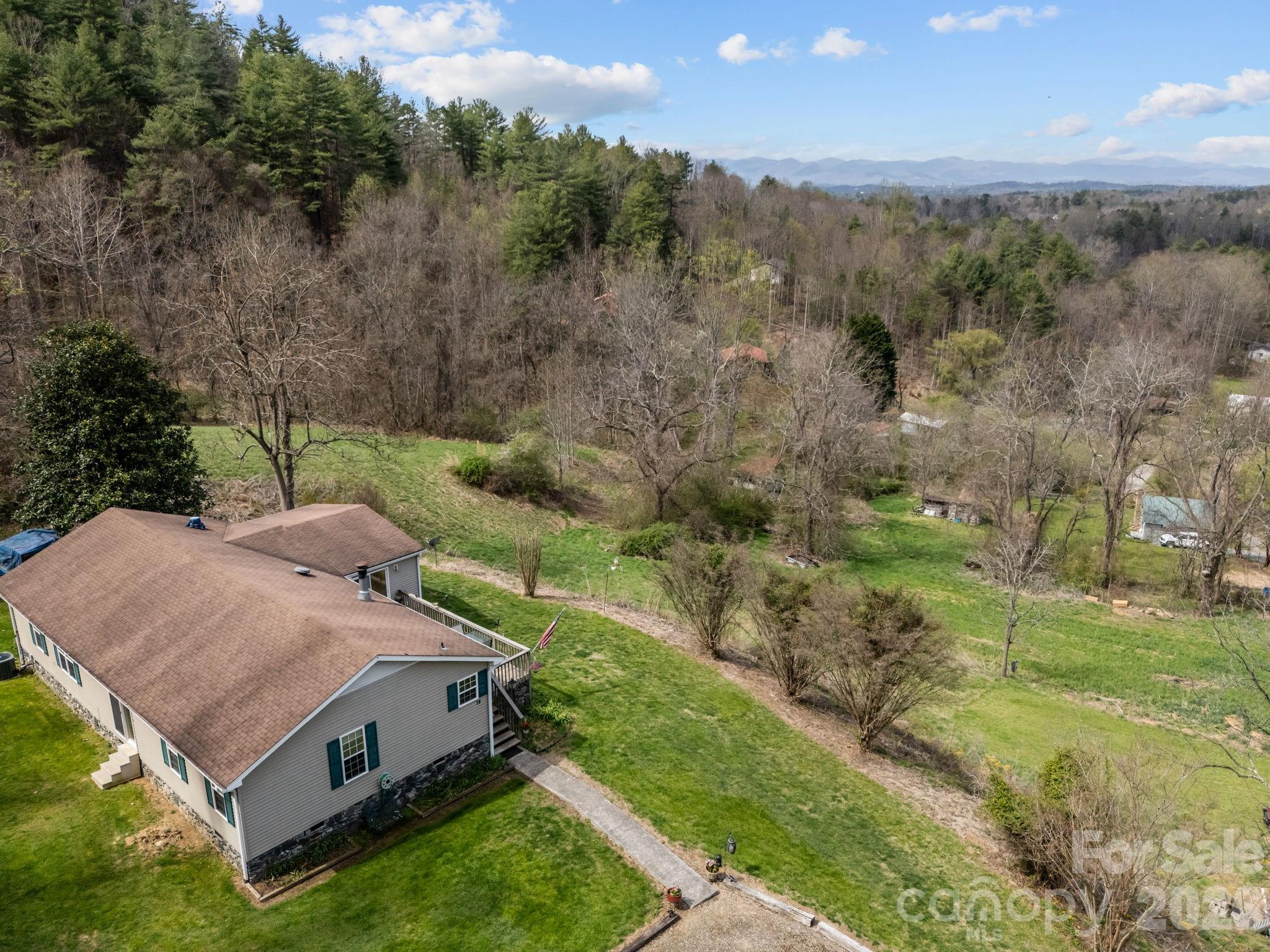 74 Chambers Road Weaverville, NC 28787 - Photo 42 of 43 a aerial view of a house with a yard