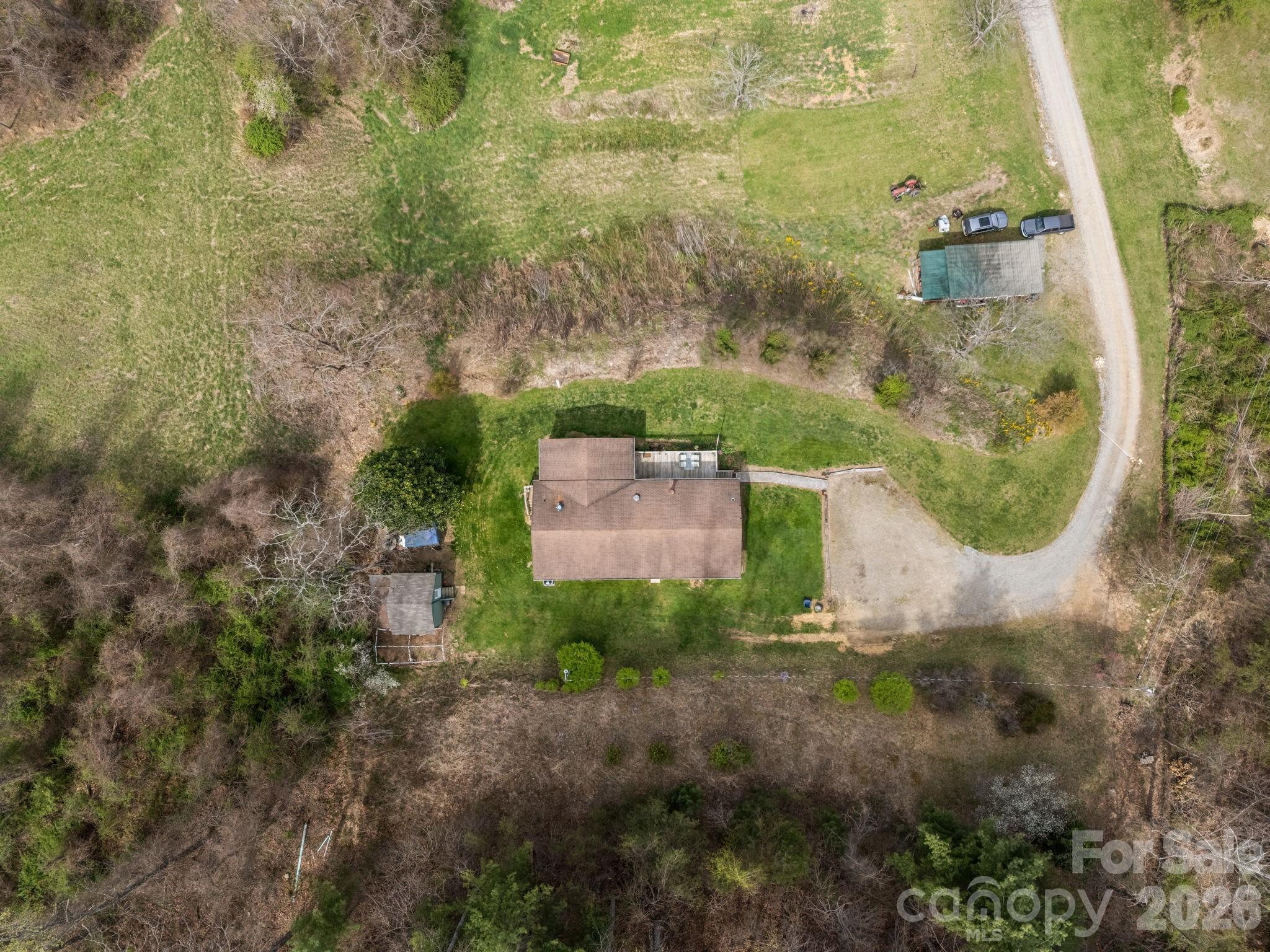 74 Chambers Road Weaverville, NC 28787 - Photo 7 of 43 an aerial view of a house with a yard