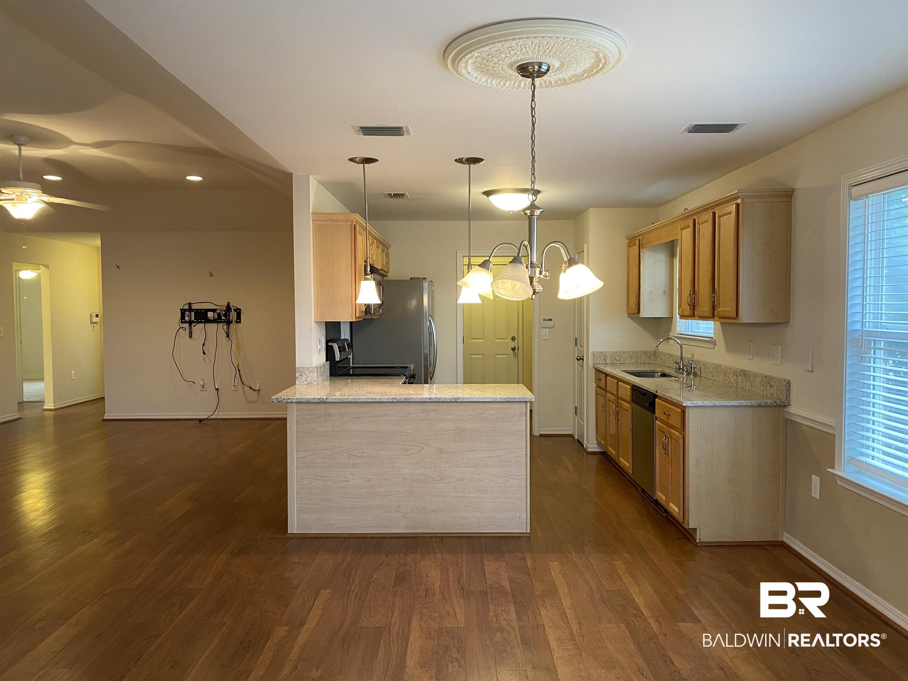 7742 Avery Lane Daphne, AL 36526 - Photo 25 of 41 Dining Room looking toward Kitchen