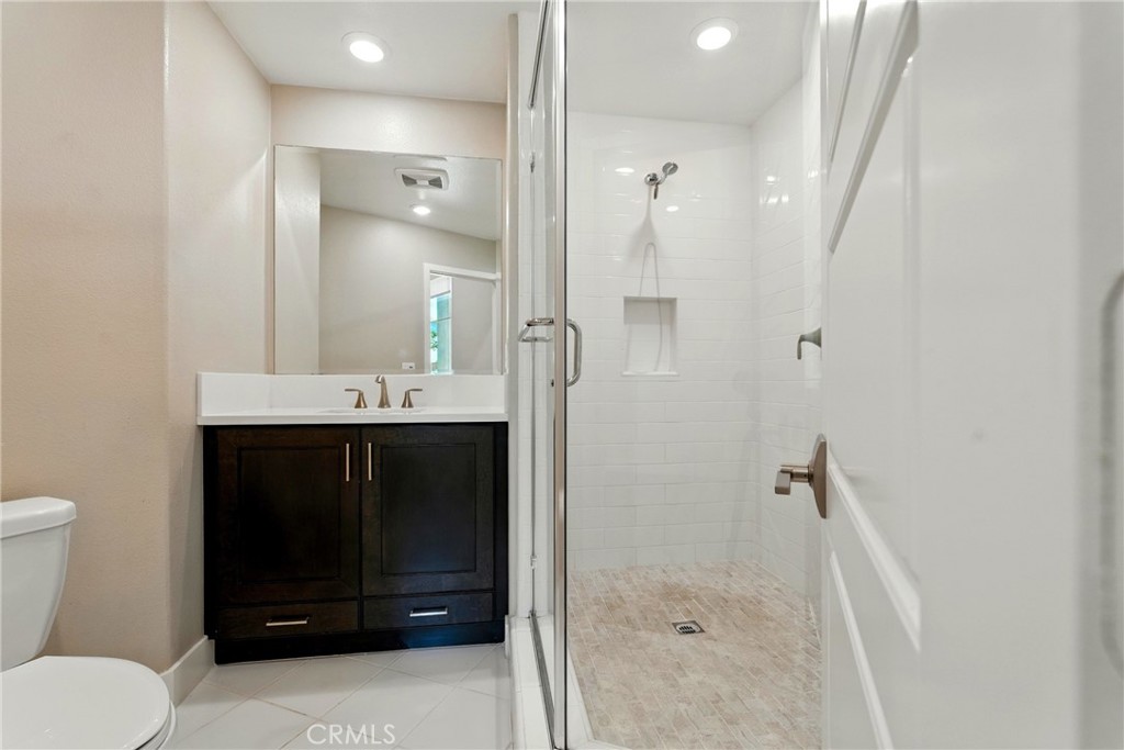 186 Stellar Irvine, CA 92618 - Photo 13 of 46 a bathroom with a sink and a mirror