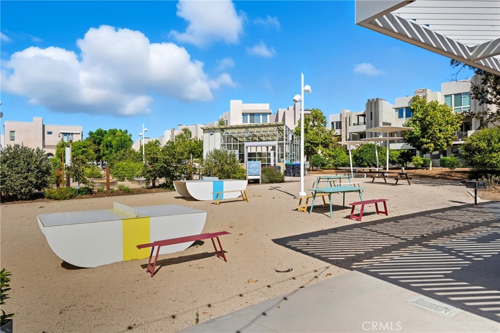 186 Stellar Irvine, CA 92618 - Photo 35 of 46 a view of a swimming pool with a lounge chair