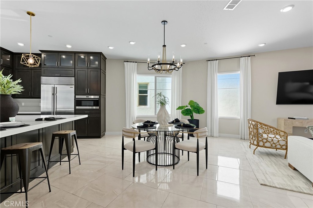 186 Stellar Irvine, CA 92618 - Photo 5 of 46 a view of a dining room with furniture