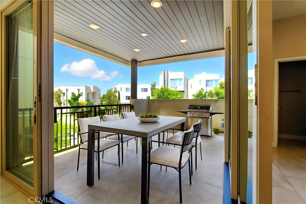 186 Stellar Irvine, CA 92618 - Photo 10 of 46 a view of a porch with dining table and chairs