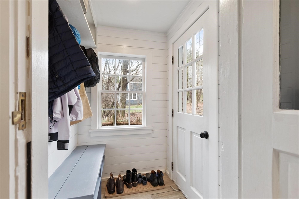 68 Still River Road Harvard, MA 01451 - Photo 13 of 41 a view of an entryway with wooden floor and windows