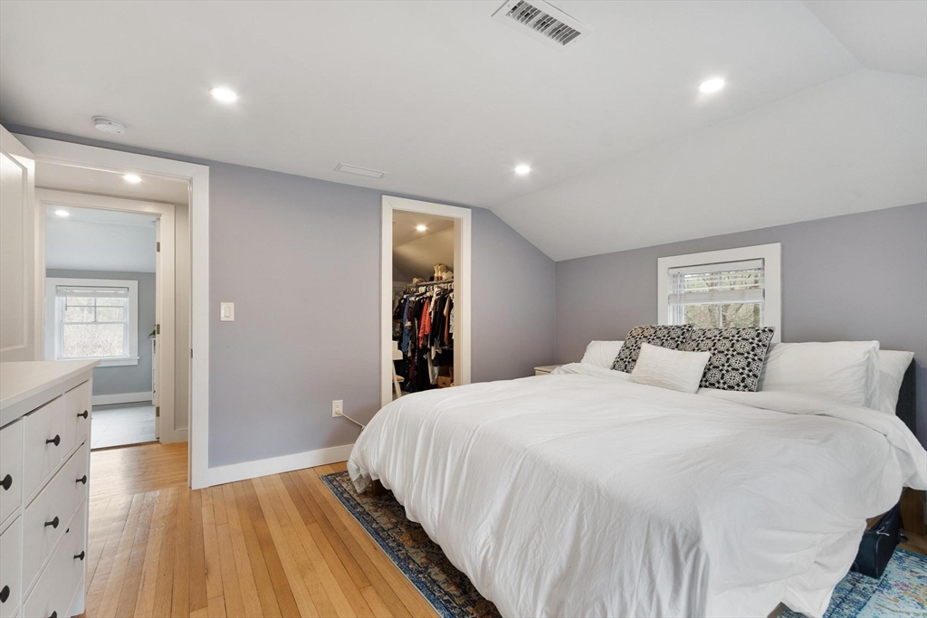 68 Still River Road Harvard, MA 01451 - Photo 23 of 41 a bed room with a bed and a mirror