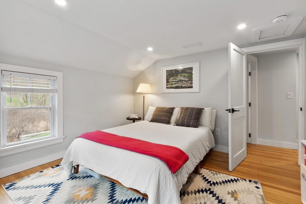 68 Still River Road Harvard, MA 01451 - Photo 24 of 41 a bedroom with a bed and a window