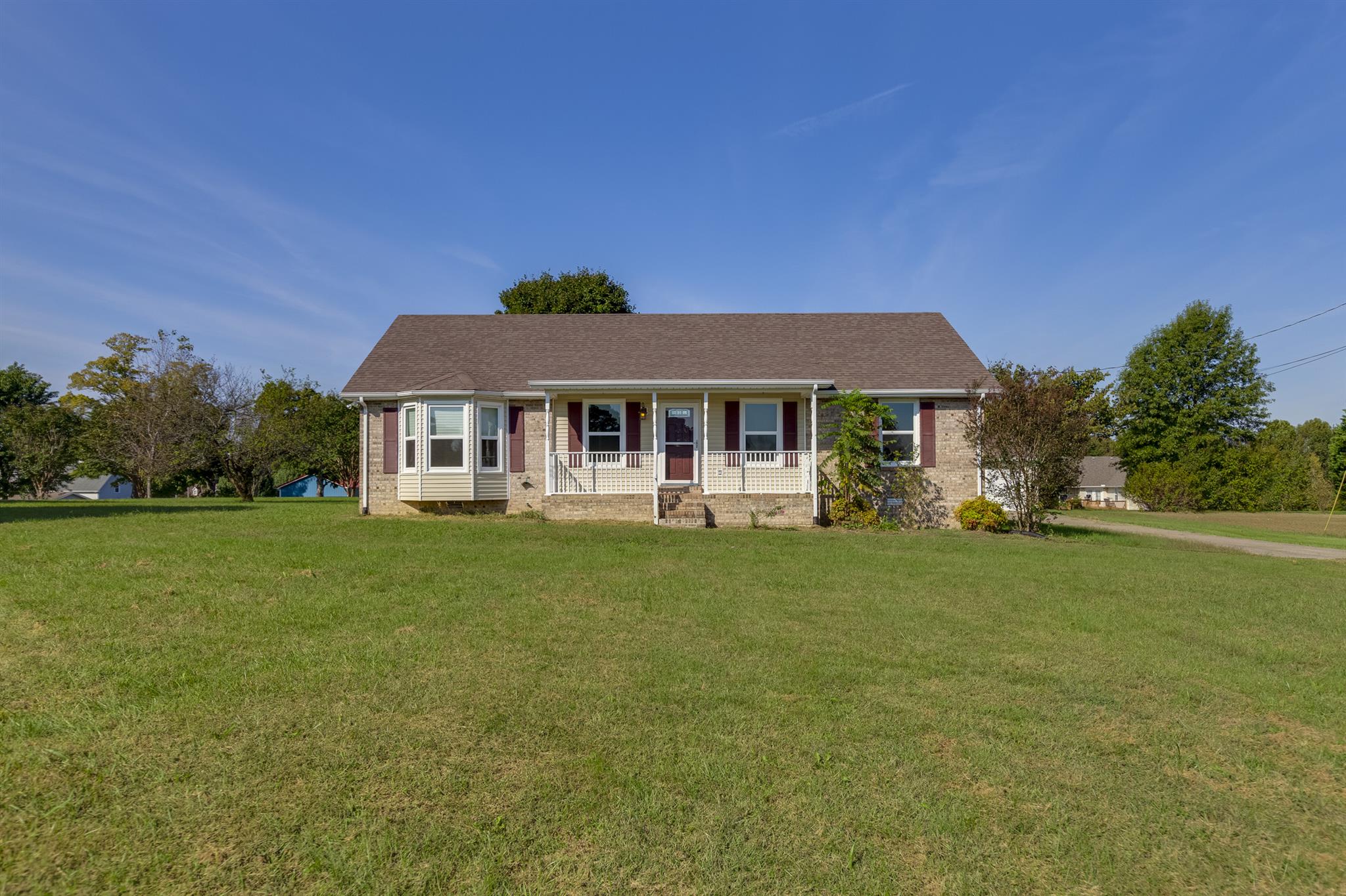 2730 West County Farm Road Springfield, TN 37172 - Photo 1 of 22 a front view of a house with a garden