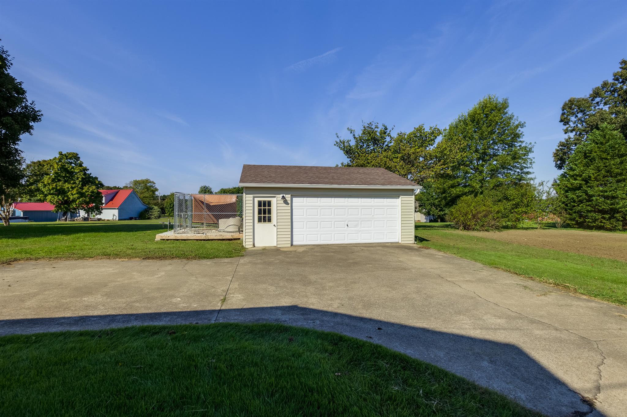 2730 West County Farm Road Springfield, TN 37172 - Photo 3 of 22 a view of a house with a yard and garage