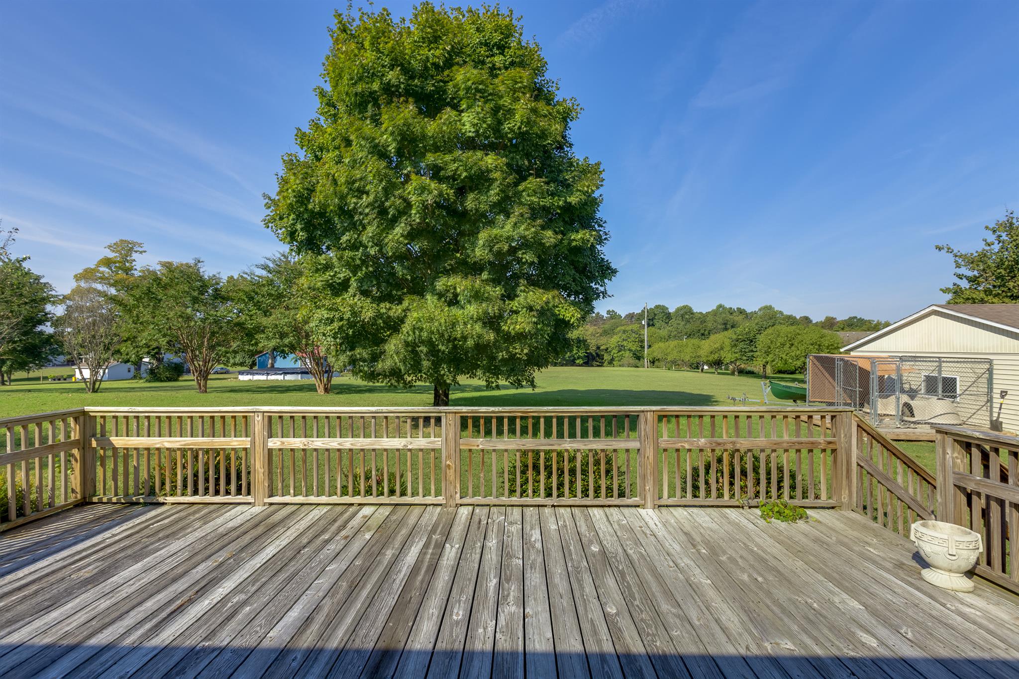 2730 West County Farm Road Springfield, TN 37172 - Photo 7 of 22 a view of a wooden deck with a yard