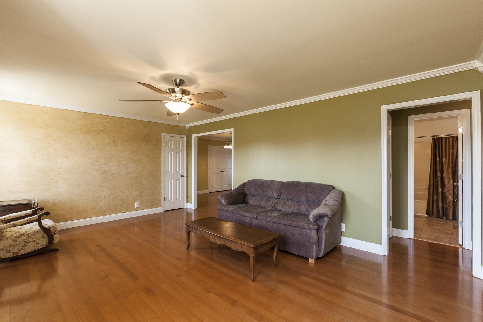 2730 West County Farm Road Springfield, TN 37172 - Photo 8 of 22 a living room with furniture and a ceiling fan