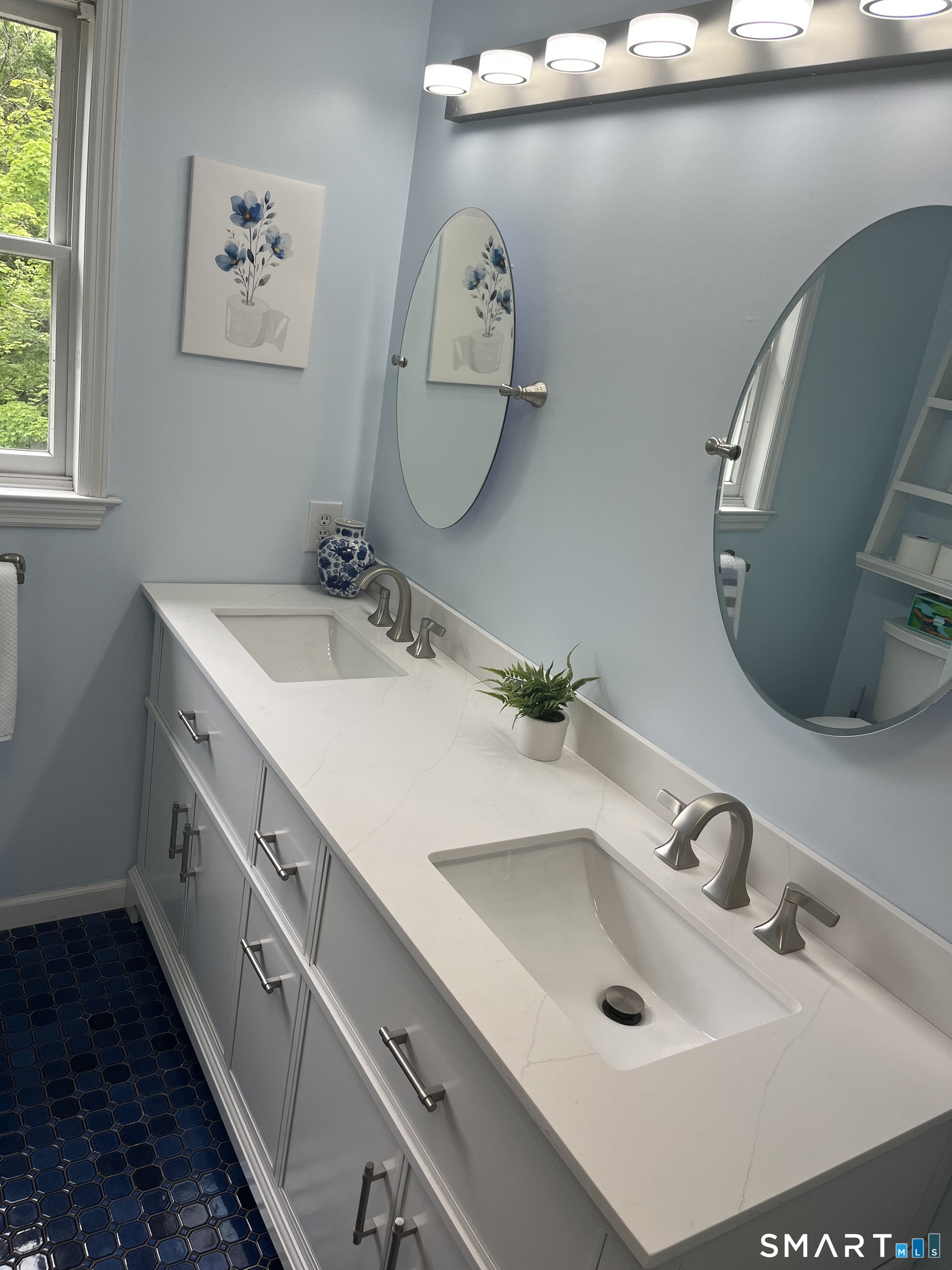47 Merwin Brook Road Brookfield, CT 06804 - Photo 18 of 29 a bathroom with a double vanity sink and a mirror