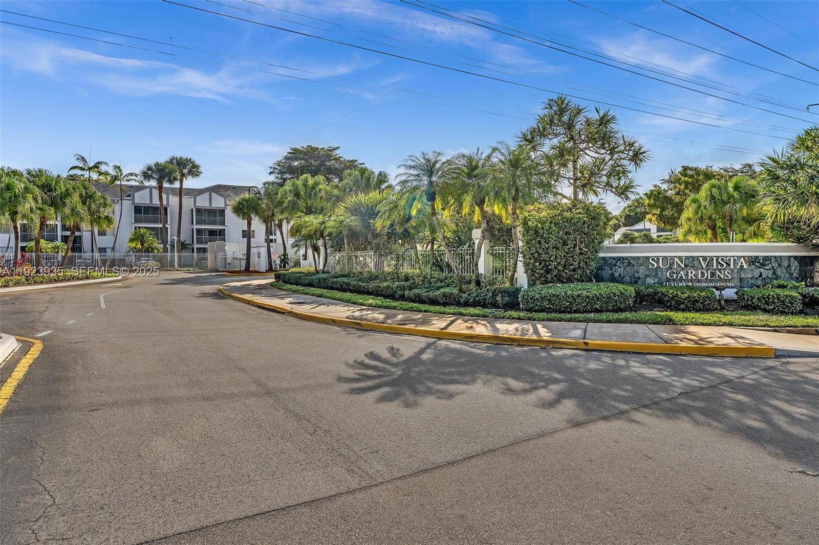 5612 Rock Island Road, Unit 151 Tamarac, FL 33319 - Photo 23 of 26 a view of a swimming pool with an outdoor space and seating area