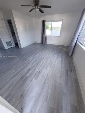 a view of a backyard of the house