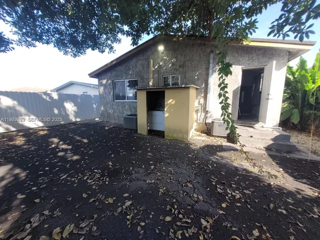a bed room with a bed and television